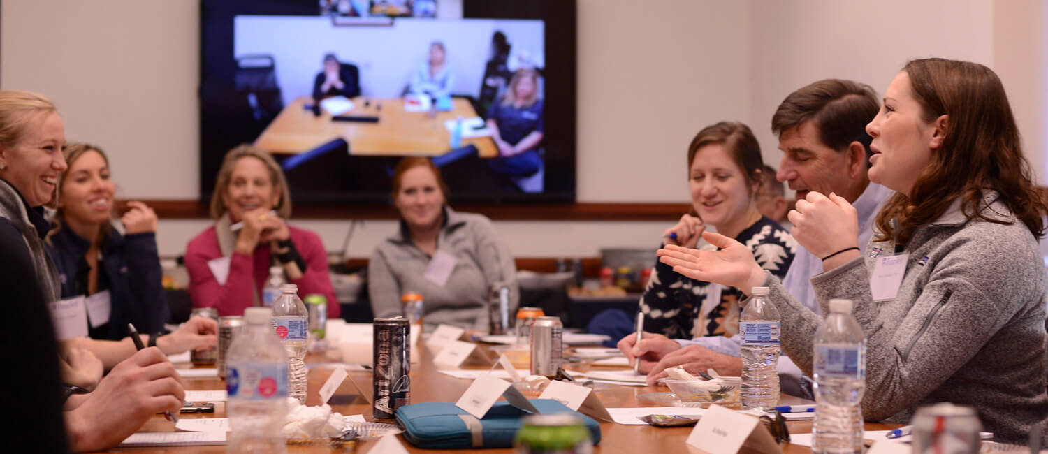 Emily Griswold, V’20 (foreground, right) participating in a student roundtable discussion hosted by Gail Riepe (background, left) for the clinical skills center.