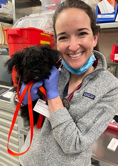 Dr. Selimah Harmon with Olive when the puppy was feeling more herself. Dr. Selimah Harmon with Olive when the puppy was feeling more herself.