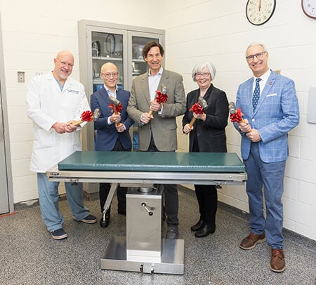 Pictured from left: Dr. Alexander Reiter, Anson Tsugawa, V’98, Richard Lichter, Nadine Chien, and Dean Andrew Hoffman.