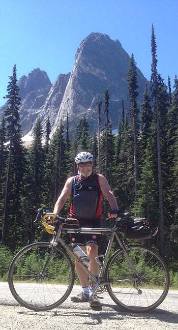 Miselis at the top of Washington Pass in the North Cascades during a 100-mile ride from the east side of the Cascades to the west side and out to the Washington coast.
