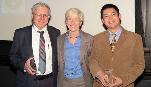 From left, Dr. Haim H. Bau, Penn Vet Dean Joan Hendricks, and Dr. Changchun Liu