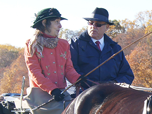 Dr. Laurie Landeau, riding with Dr. Bruce Rappaport