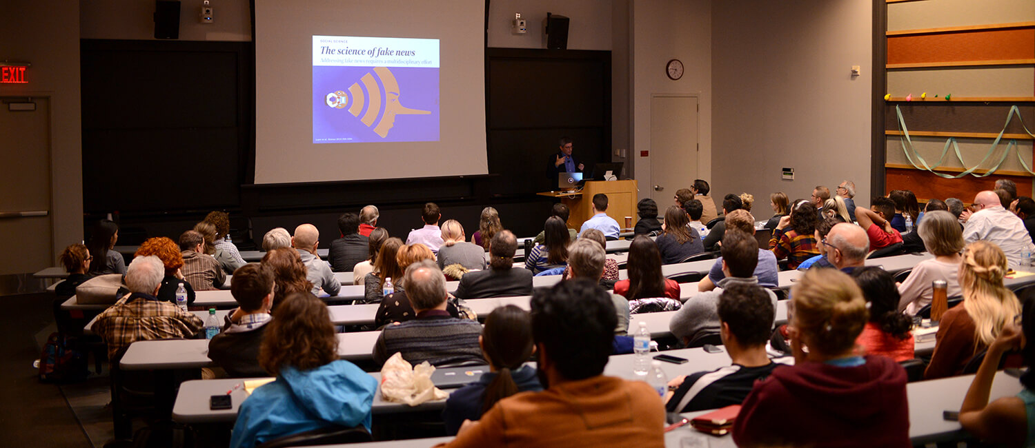 Carl Zimmer speaks at the fifth annual Microbiome Syposium.