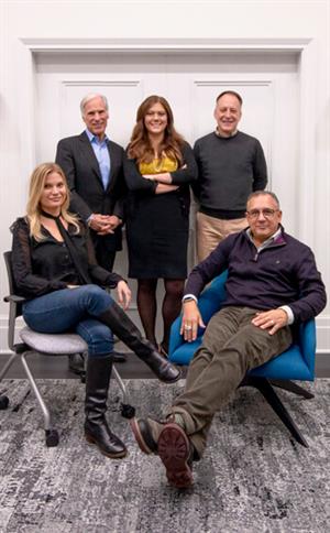 Penn Vet’s Hannah Kleckner Hall (back row, center) and Martin Hackett (back row, right) pictured with the LevLane creative team.