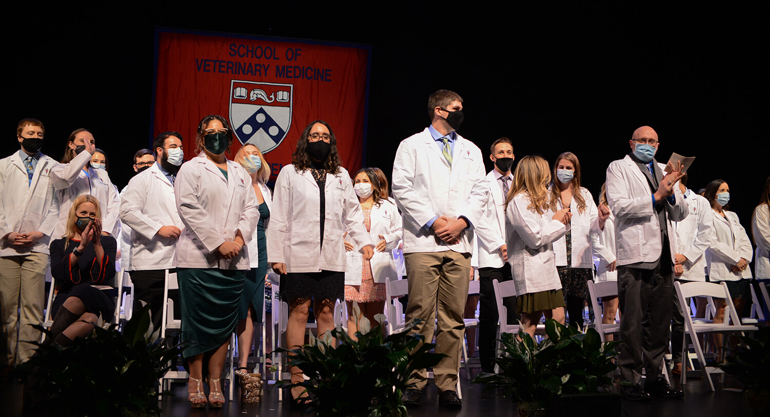The Class of 2023 dons their white coats.