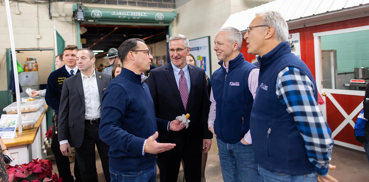 Photo of Penn Vet Dean Andrew Hoffman (far right), Penn’s Director of Commonwealth Relations Mike Smith (second from right) with then-governor-elect, now Gov. Josh Shapiro and Pennsylvania Secretary of Agriculture Russell Redding during Public Officials Day at the Farm Show.