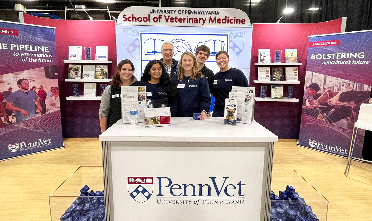 Photo of Penn Vet students with Dean Andrew Hoffman at the Farm Show