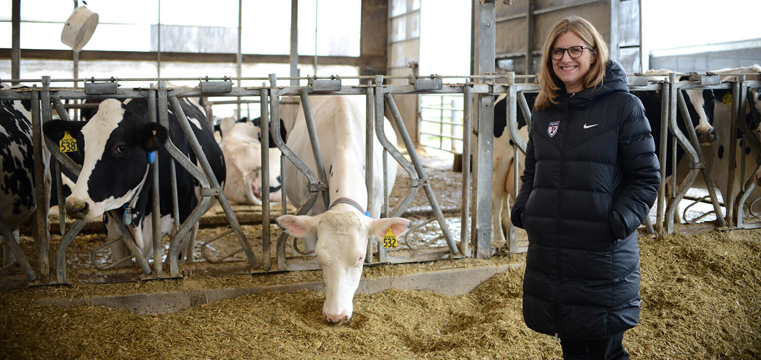 Photo of President Magill at the Marshak Dairy at New Bolton Center
