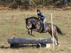Monica and Tractor running the cross-country course at Waredaca in Maryland.