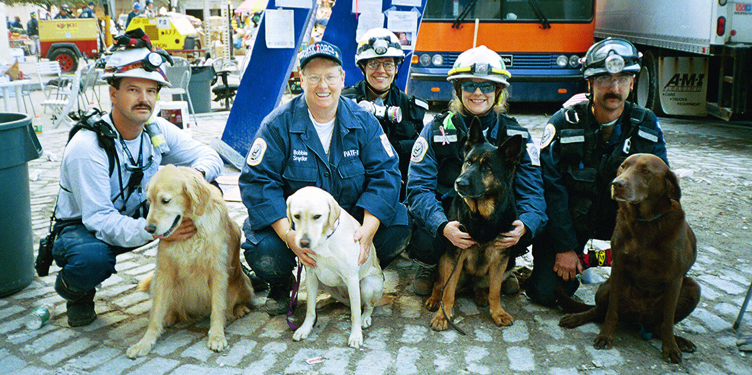 Otto (back row) served at Ground Zero, caring for the search-and-rescue dogs that deployed there following the 9/11 attacks. The experience catalyzed a research project that laid the foundations and provided inspiration for the Center’s launch. (Image: Courtesy of Cynthia Otto)