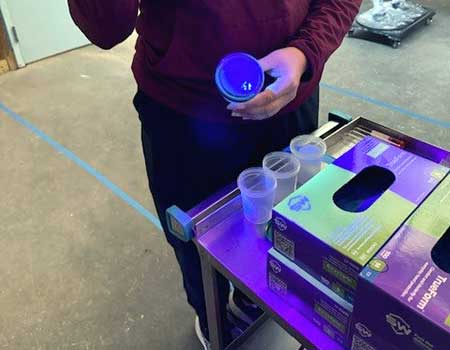 UV light on glo germ on fecal cup