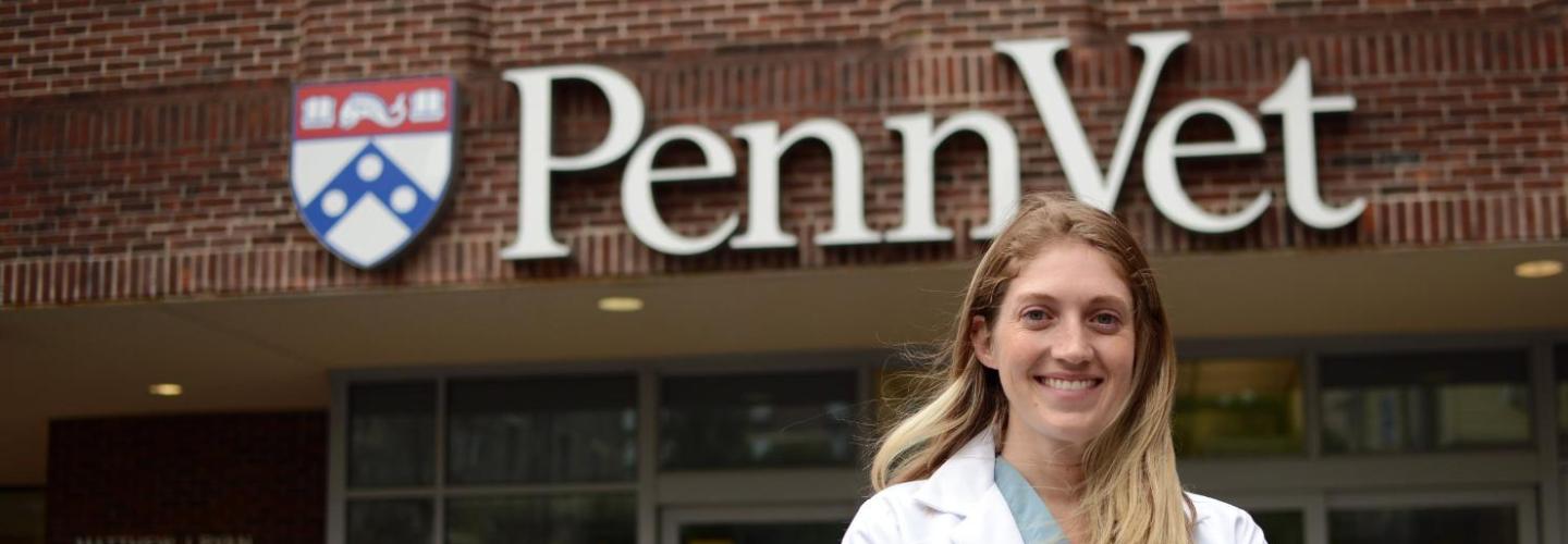 Woman standing in front of Penn Vet sign