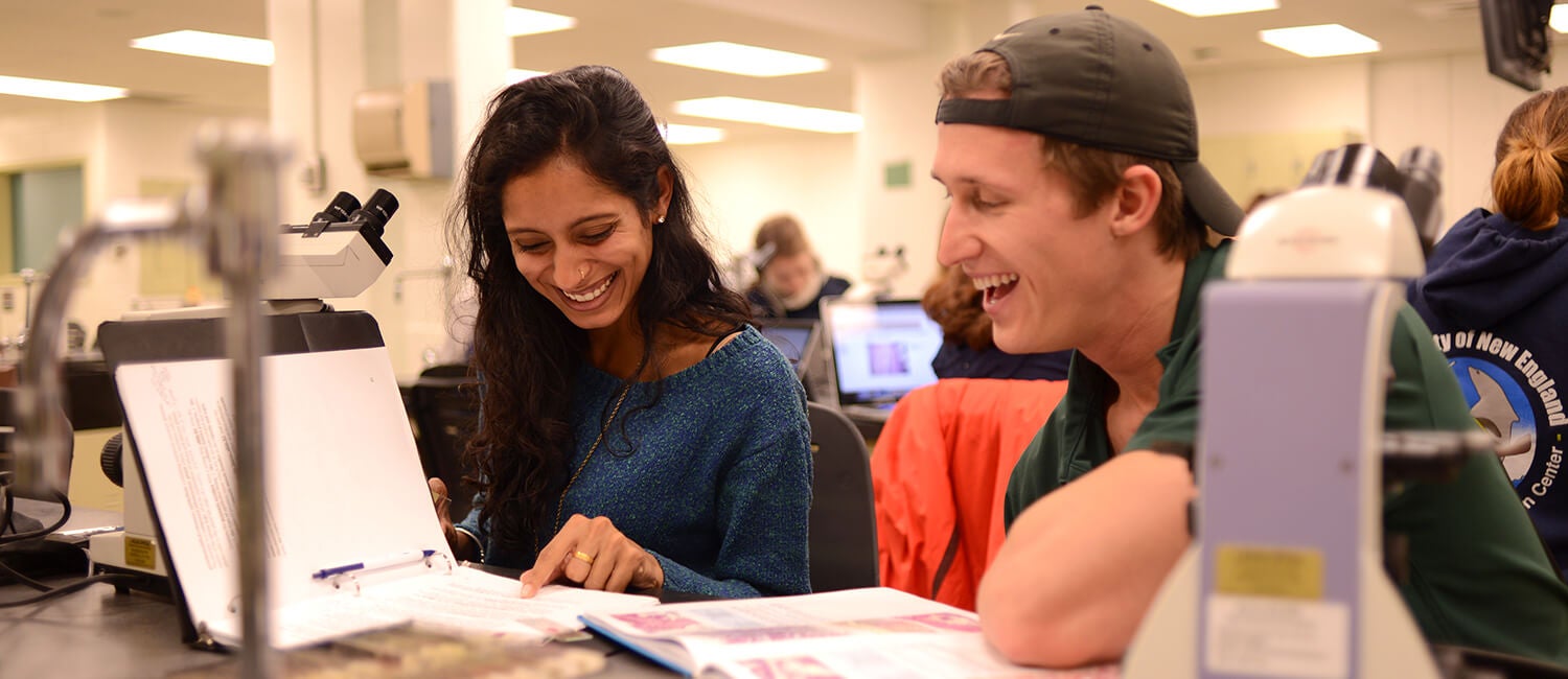 Two students talking to each other