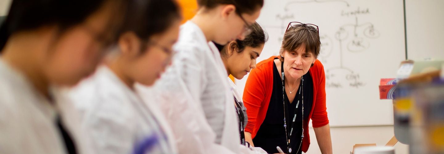 a group of people working in a lab