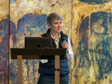 Mason speaking at event