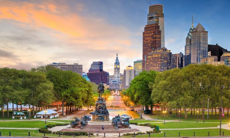 the city of philadelphia skyline at sunset