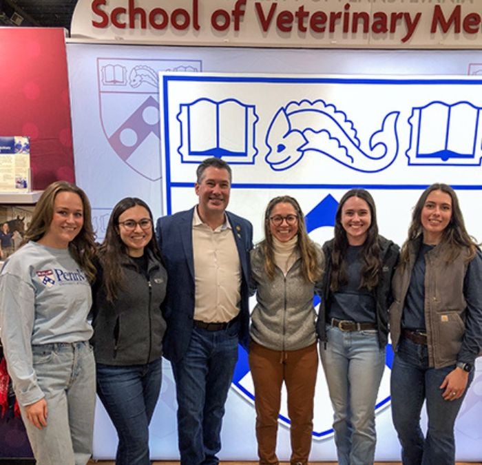 A group of students with a politician.