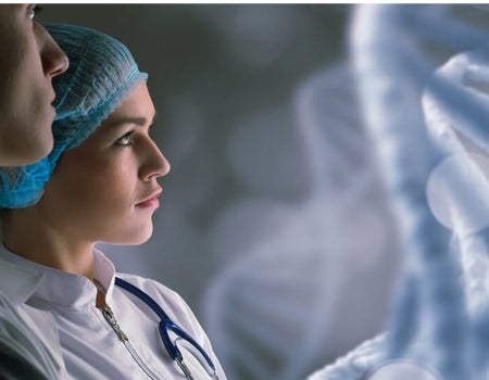 Two people looking a an X-Ray.