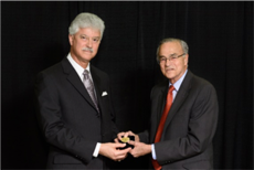 A person being presented an award